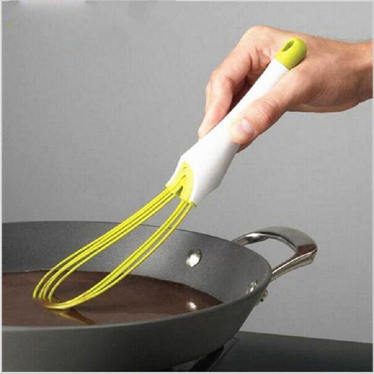 Frusta per uova rotante in plastica, multifunzionale e manuale, facile da pulire; strumento per impasti e prodotti da forno.